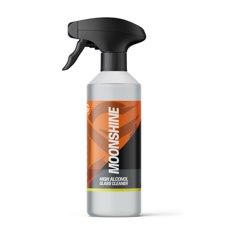 Spray bottle labeled 'Moonshine' on a white background