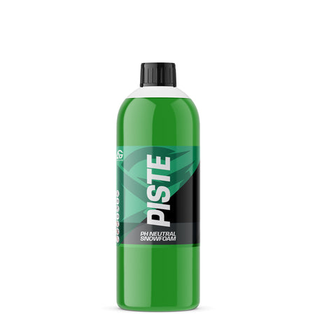 A green bottle of Piste pH Neutral Snowfoam with a black cap and a black and green label, shown on a plain white background.