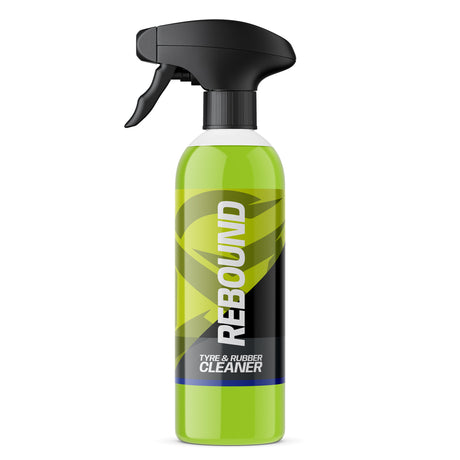 A bottle of REBOUND Type & Rubber Cleaner with bright green liquid, a black spray trigger top, and a black and lime green label, shown on a plain white background.